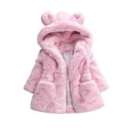 A girl's fur coat for autumn and winter